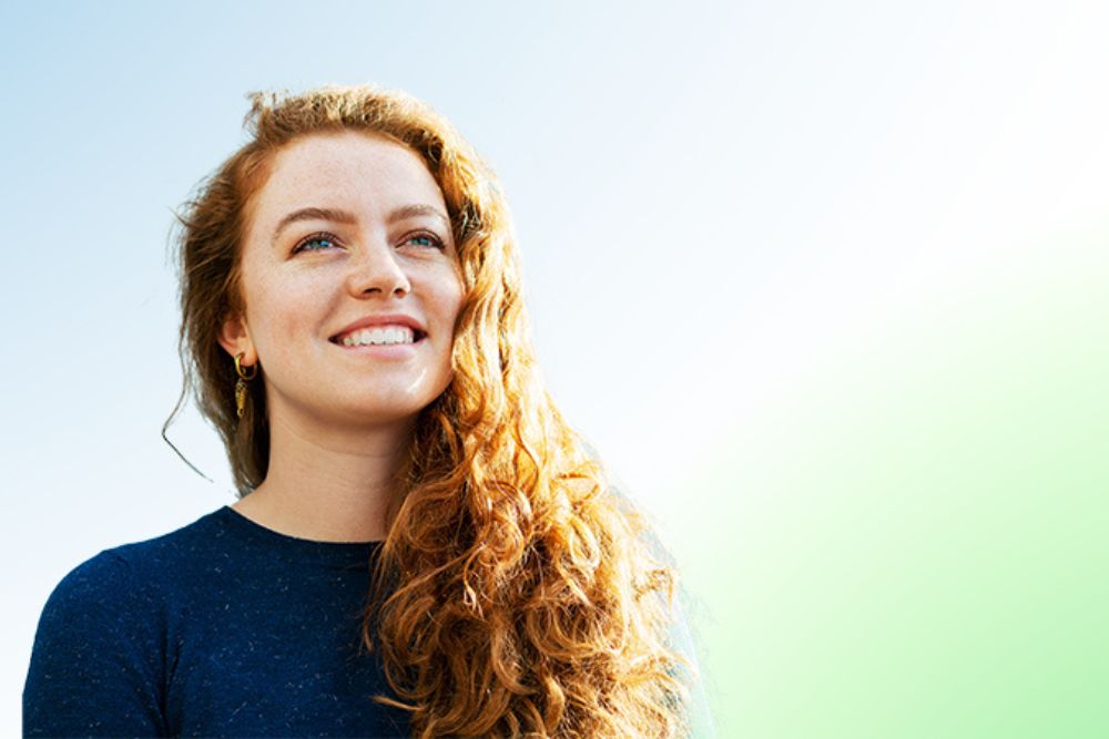 Young woman happily looking off screen