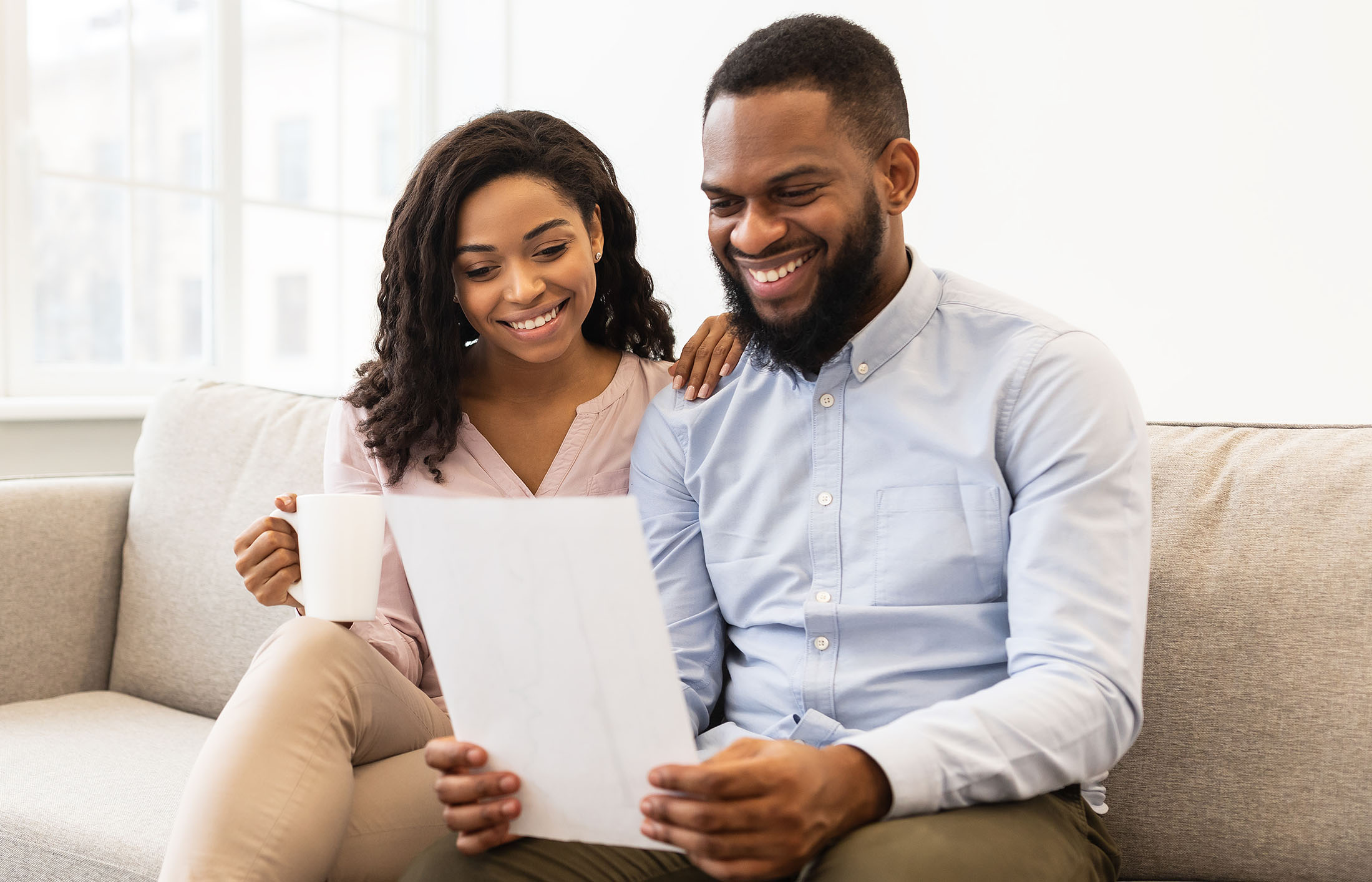 couple looking at statement