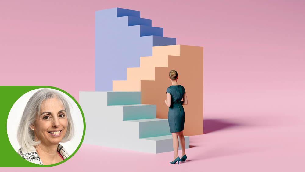 Woman looking up three staircases