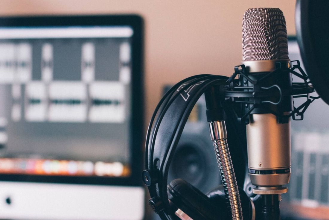 Close-up of a microphone in a podcast studio