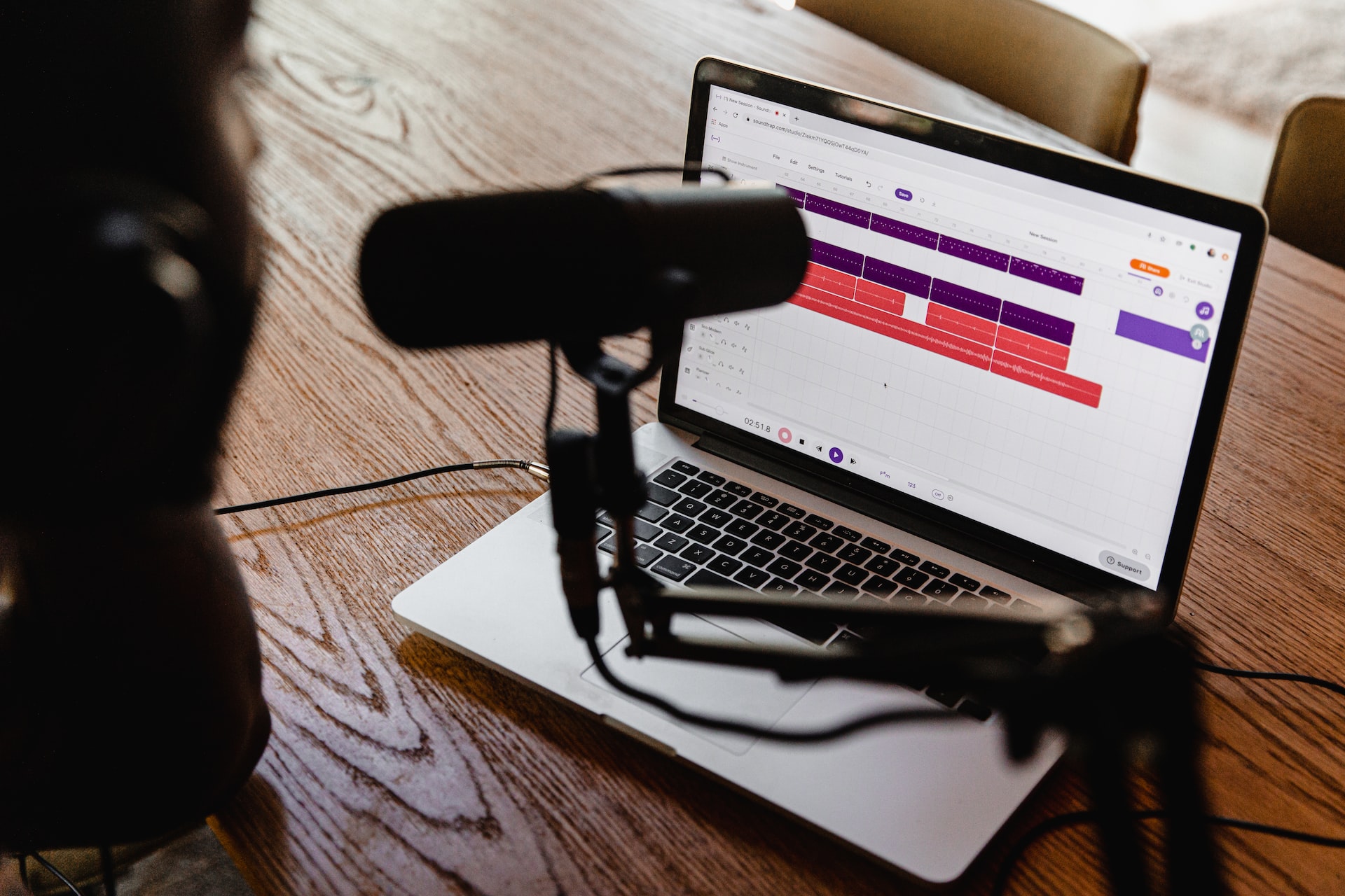 Close up of a microphone and laptop