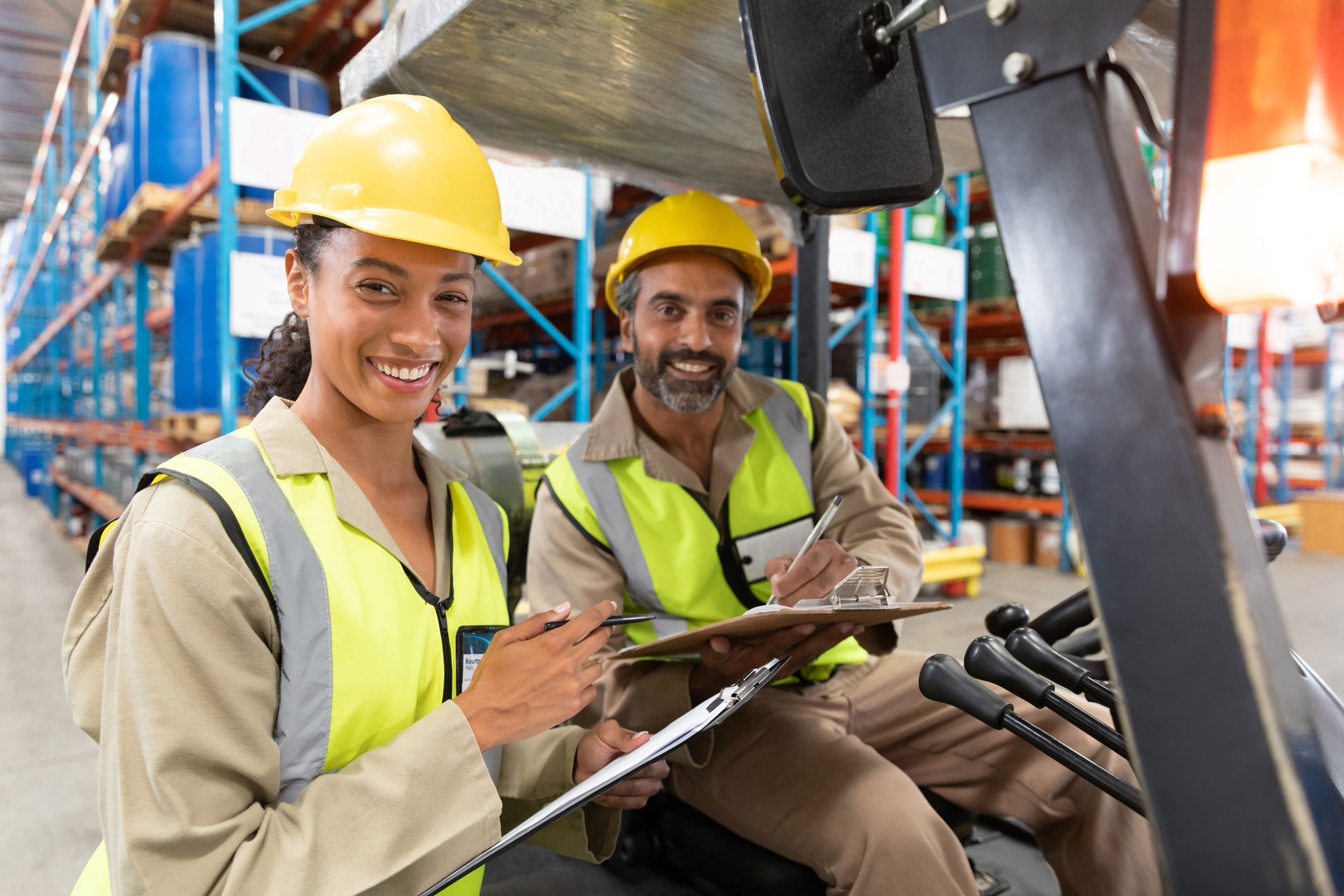 Two employees signing up for an update session