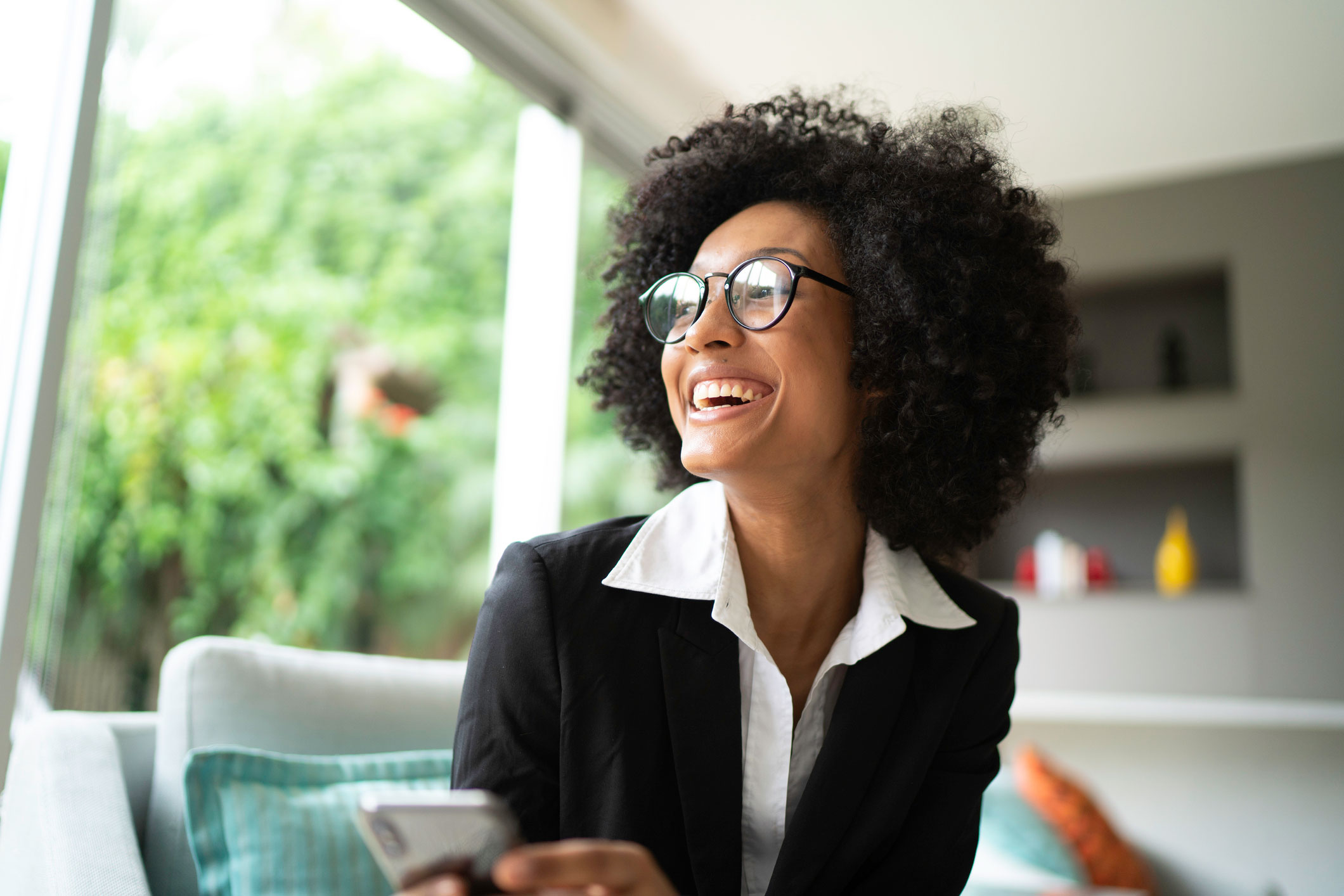 Woman in a loft smiling